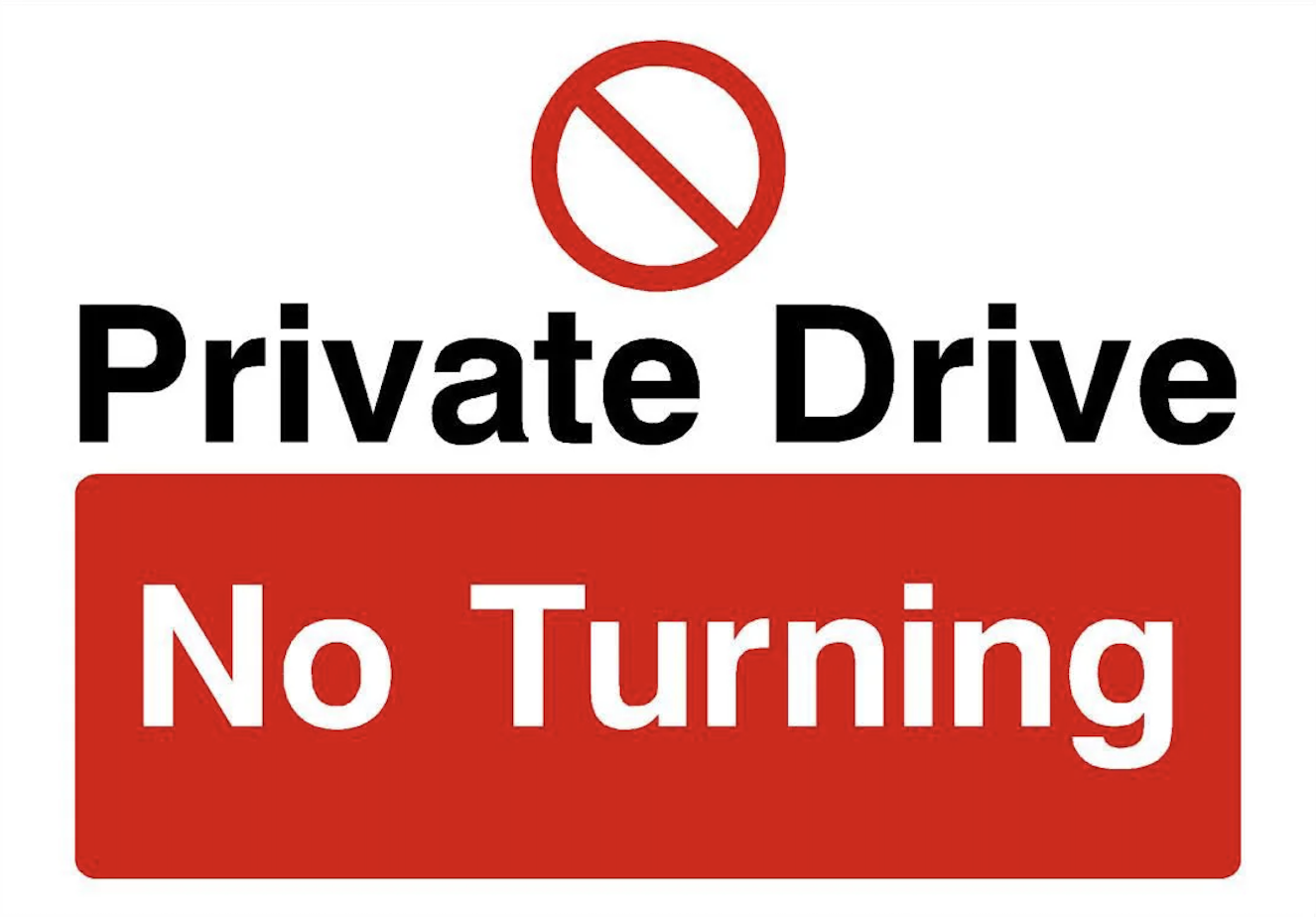 A sign that reads: Private drive. No turning