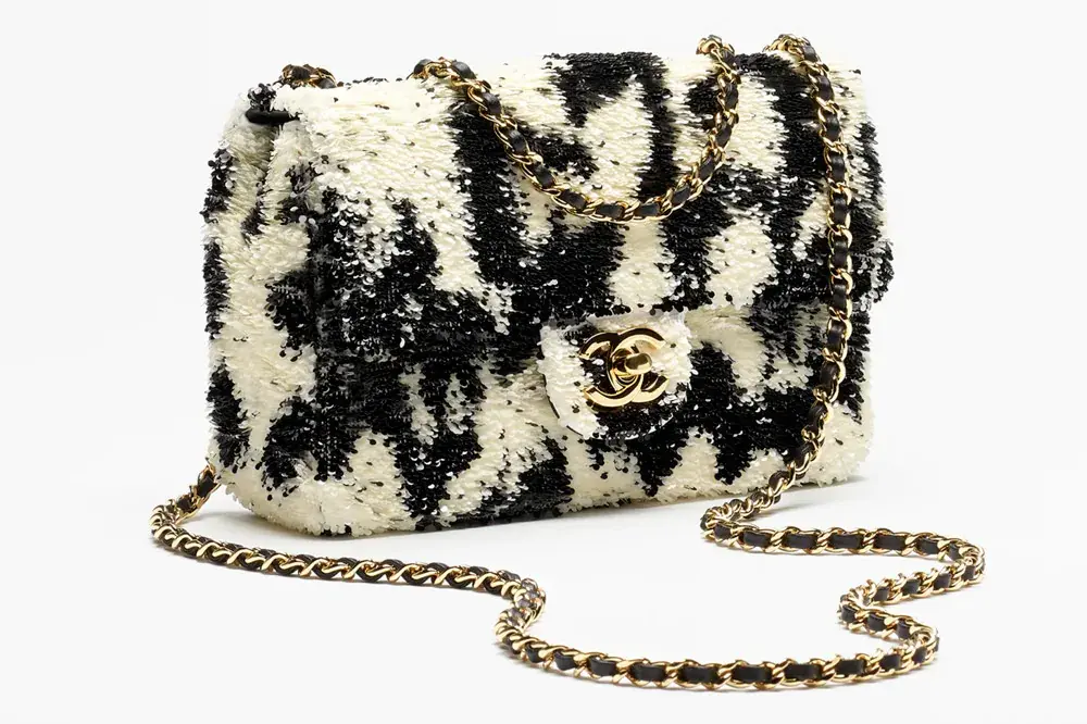 Маленькая сумка Chanel с клапаном