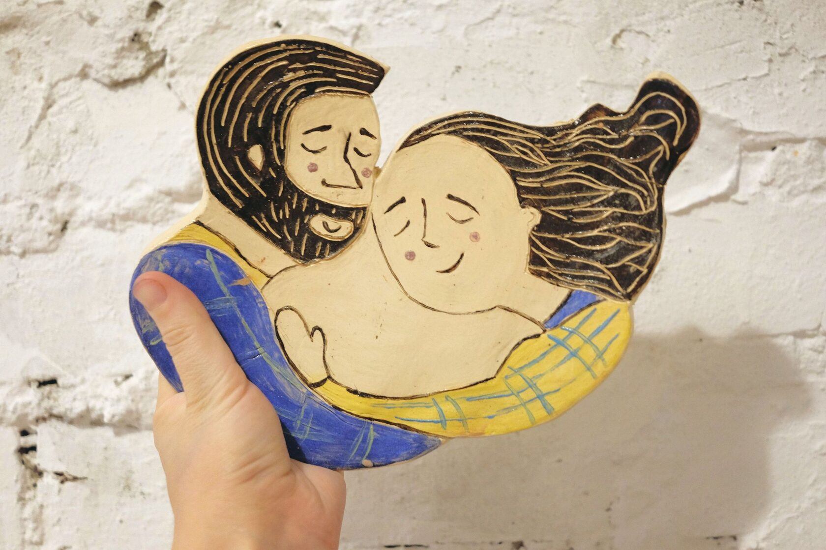 custom clay portrait wall panel, creative pottery making Toronto project