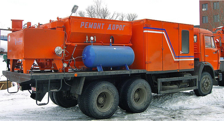 Машина для ремонта дорог горячей смесью, предназначенная для механизации ямочного ремонта дорог с покрытием из асфальтобетонных и битумоминеральных смесей