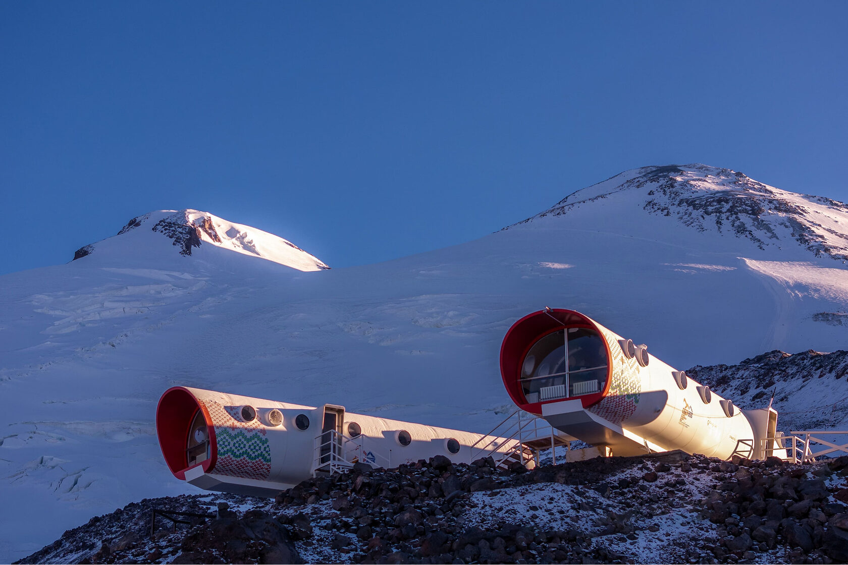 LeapRus capsule huts on the Elbrus slope under the twin summits
