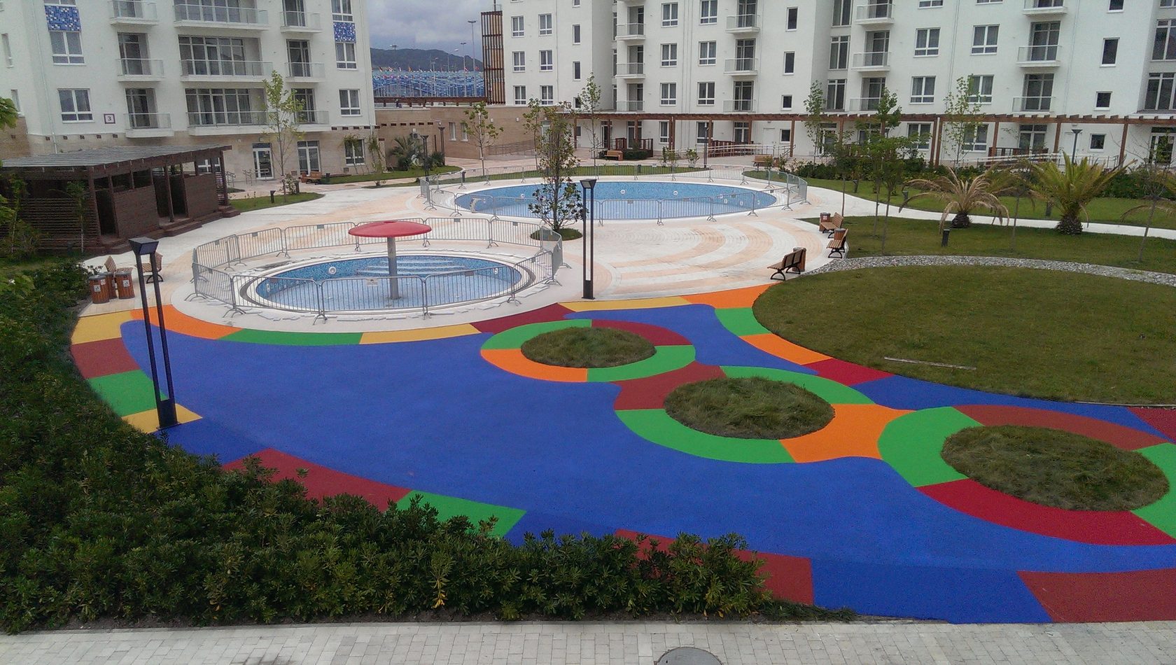Площадки в детском саду с резиновым покрытием