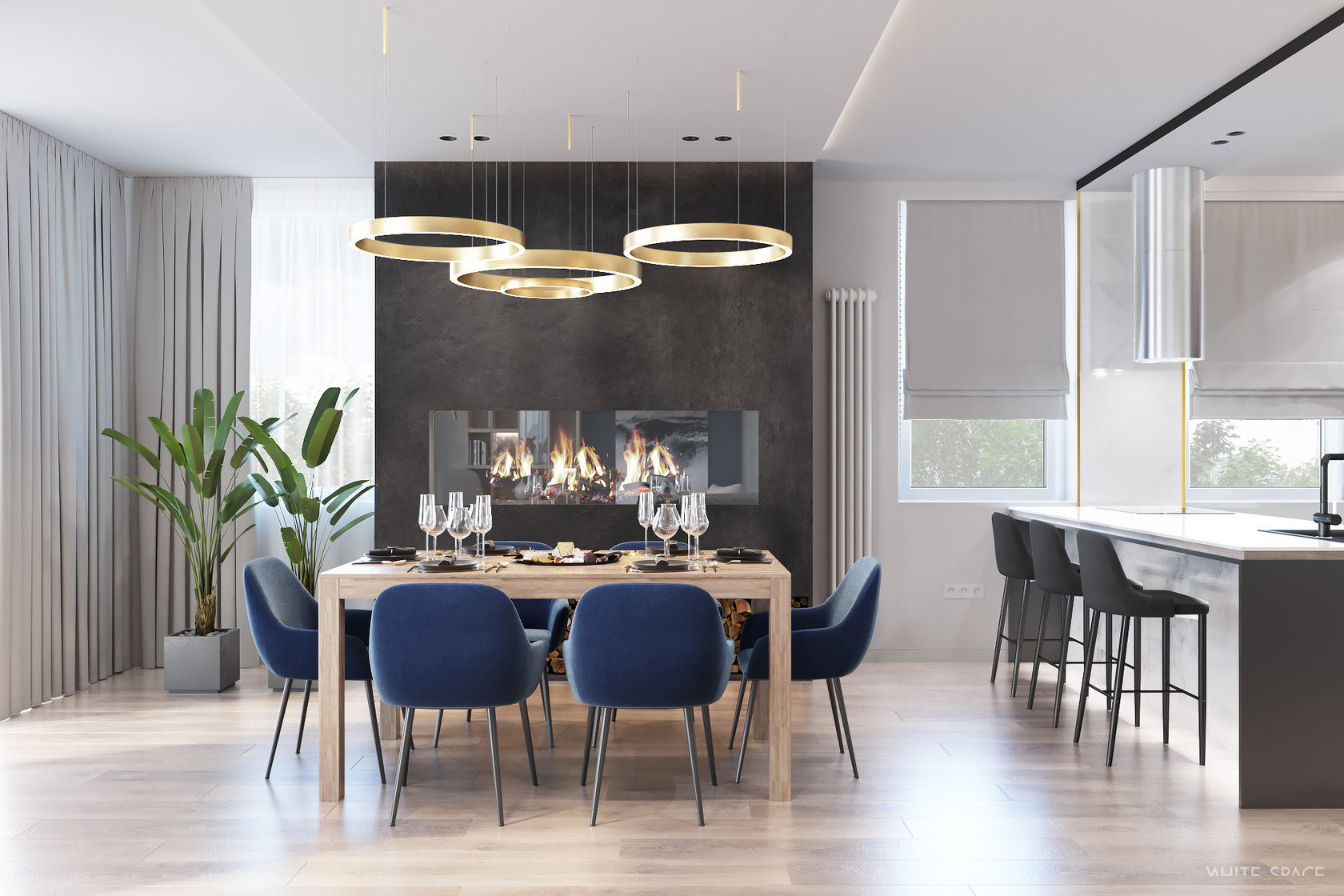 Décoration salle à manger avec table en bois, chaises bleues et cheminée
