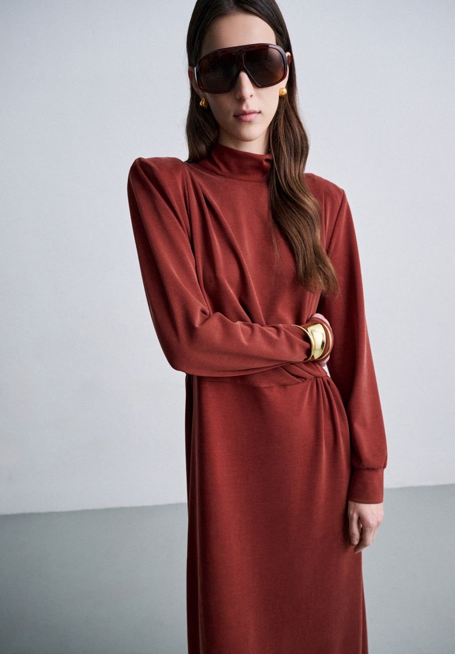 SU: long draped brick-red dress