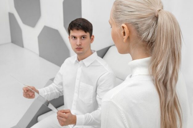 Man and woman with plastic board