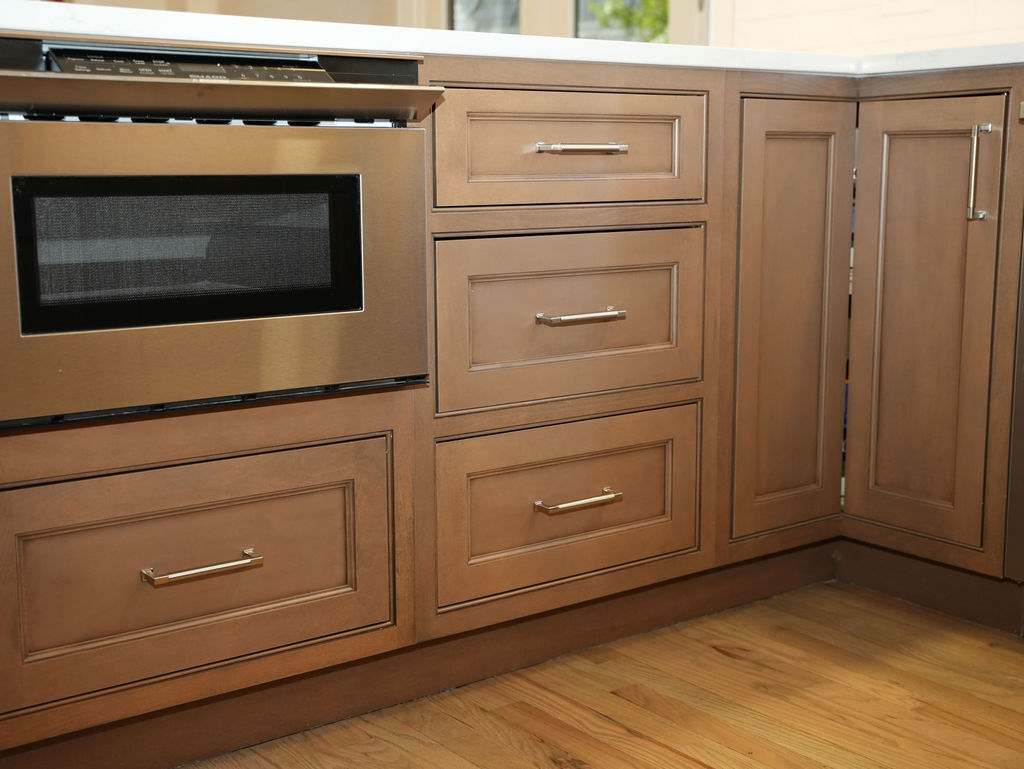 Custom kitchen cabinetry with island and built-in storage by CASA Kitchen &amp; Bath in Naperville, Illinois