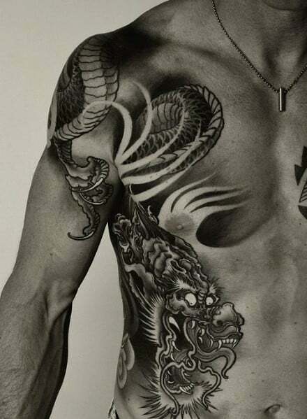 Эскизы мужских татуировок на плече (106 фото)
