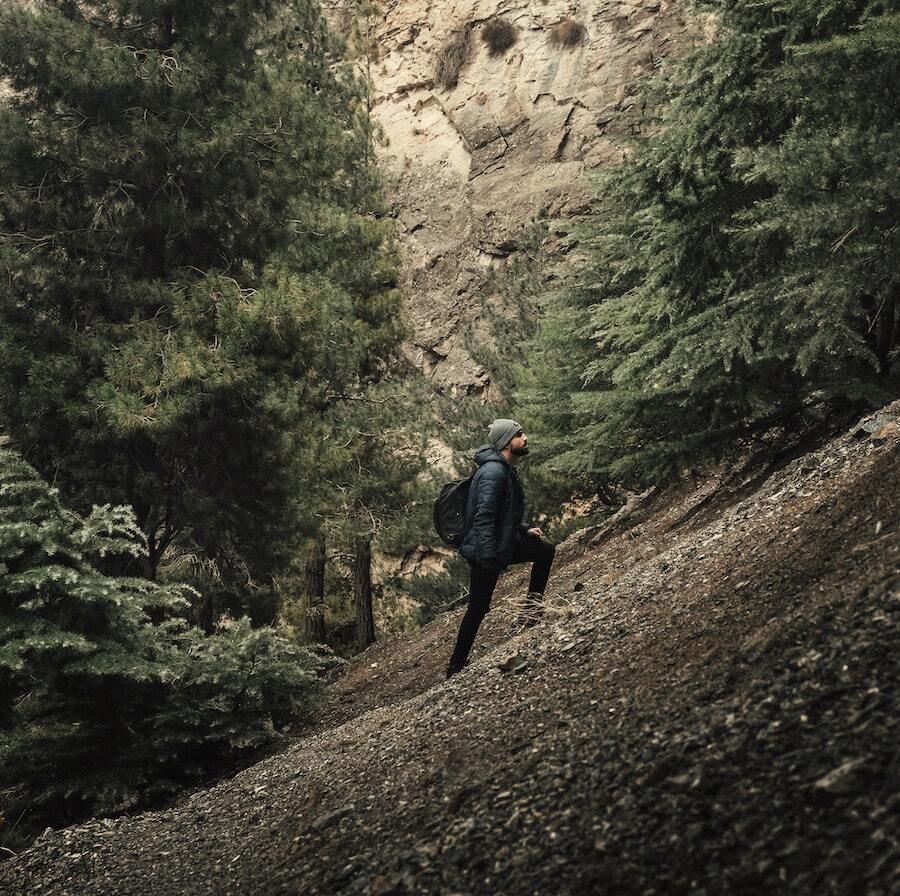 a man climbing a mountain