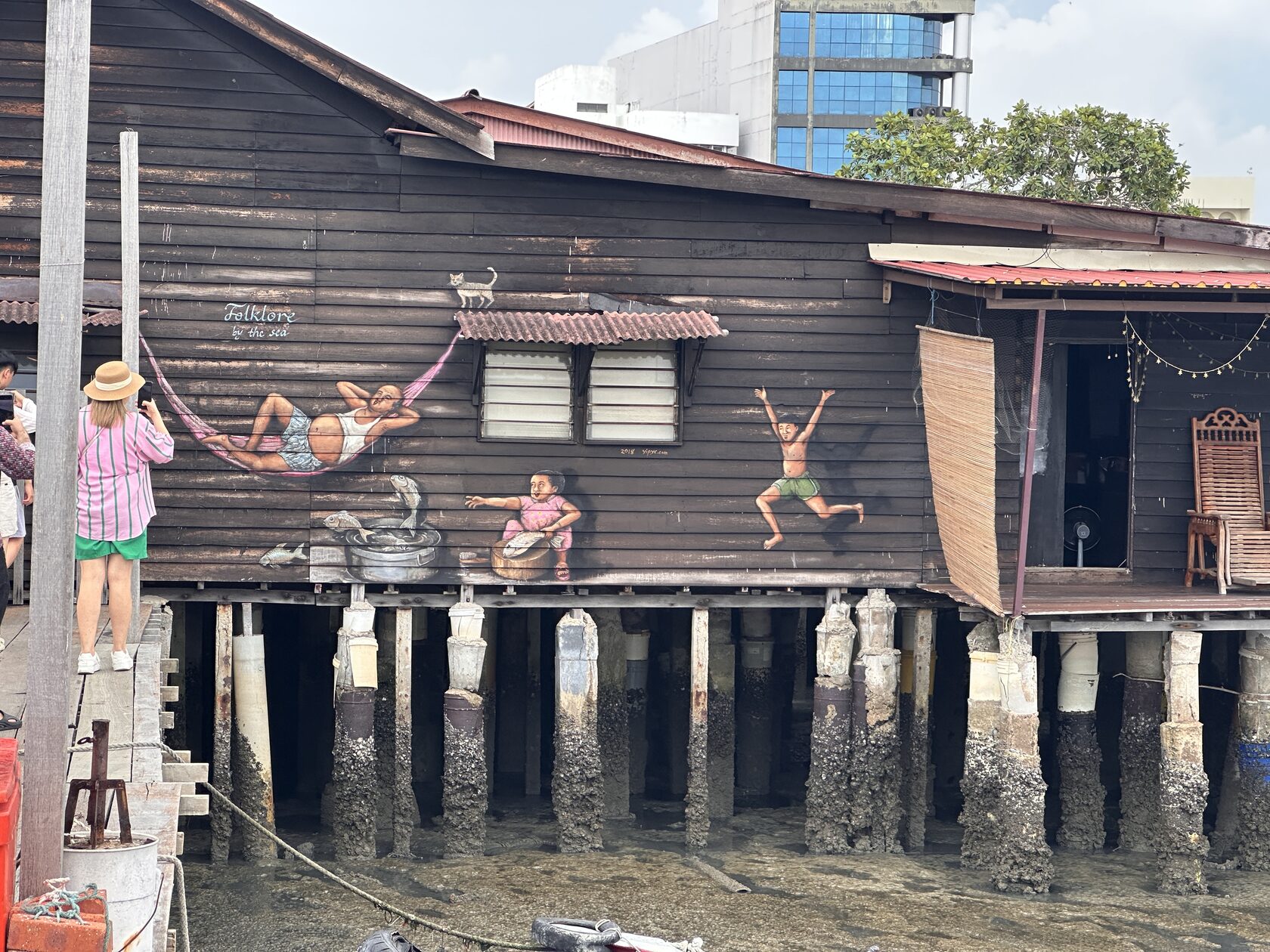 Деревянные дома на сваях в районе Chew Jetty