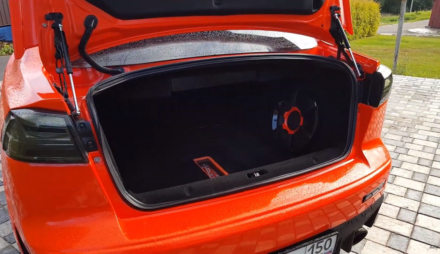 сабвуфер Mitsubishi Lancer X