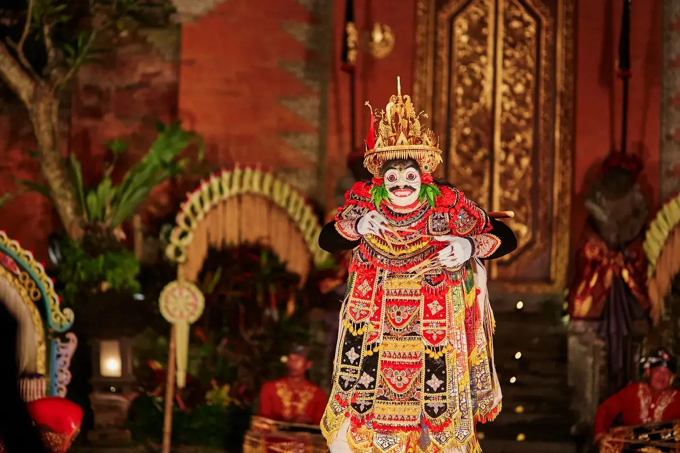 An elaborate traditional Balinese dancer performing at the royal palace, a captivating cultural choice for what to do in Ubud at night.