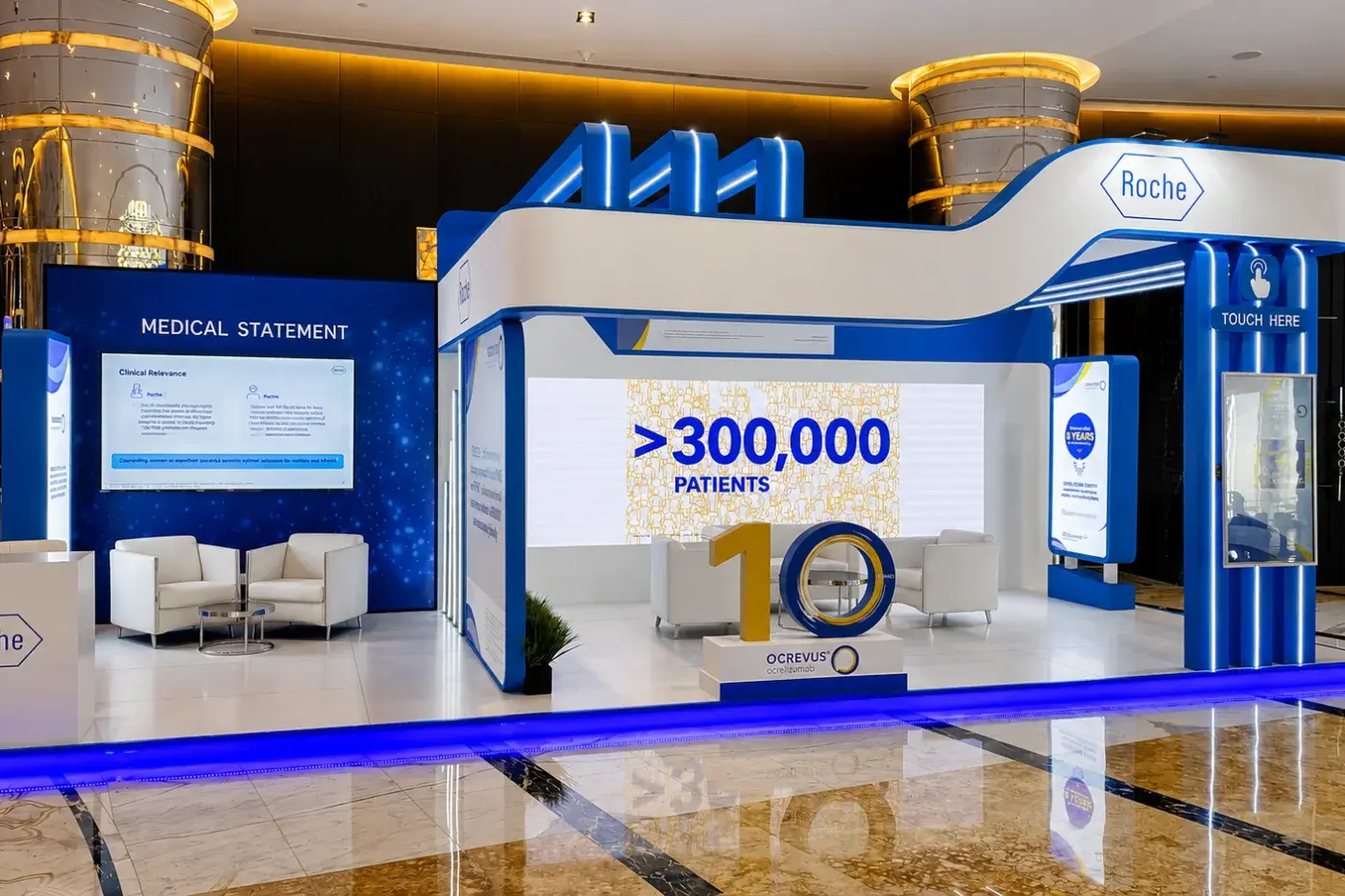 Two-level exhibition stand with a data wall and an upper meeting deck