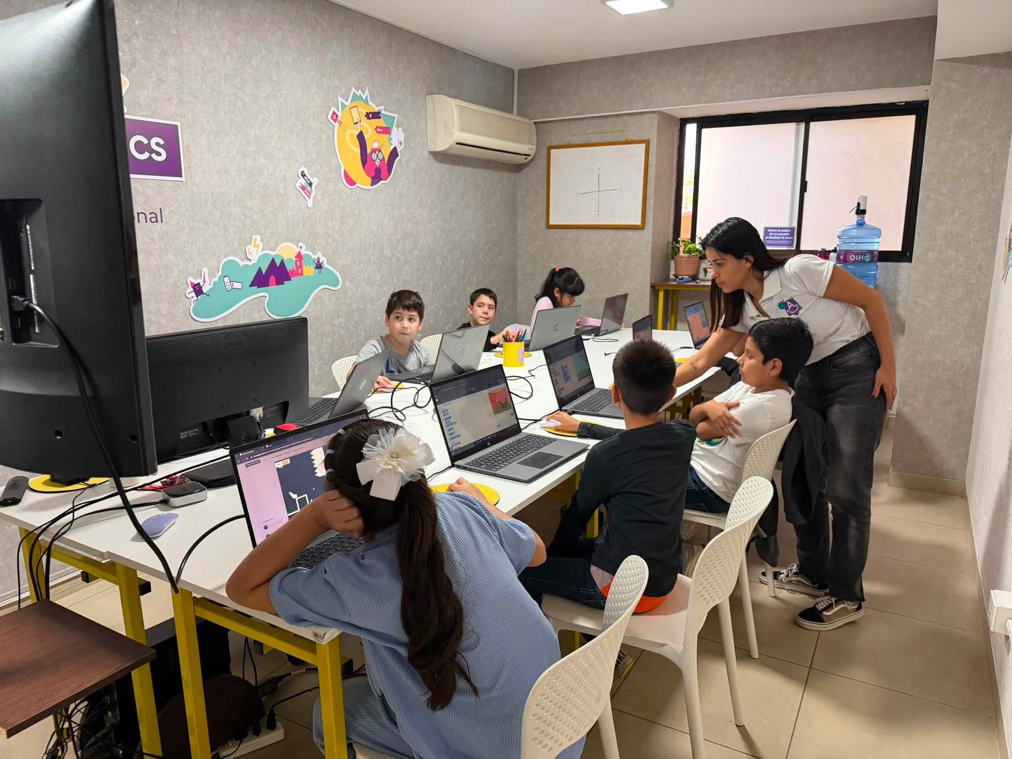 kids building Roblox games at an Algorithmics workshop in Santa Cruz, Bolivia