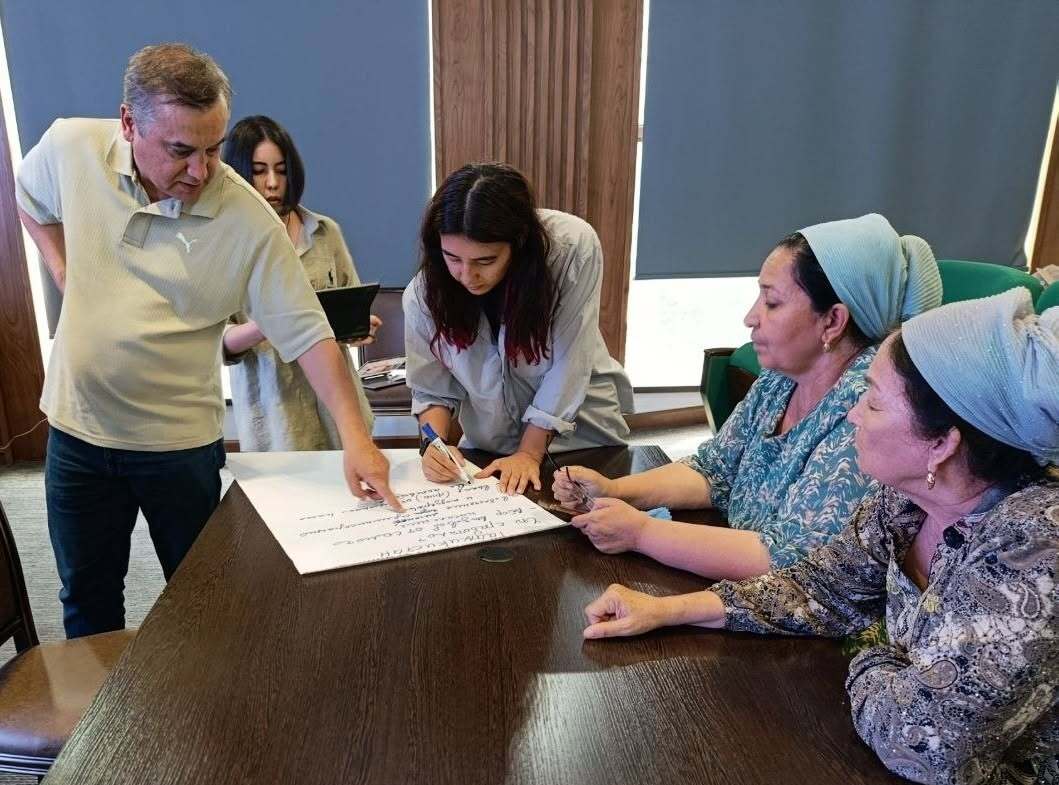 May be an image of studying and table