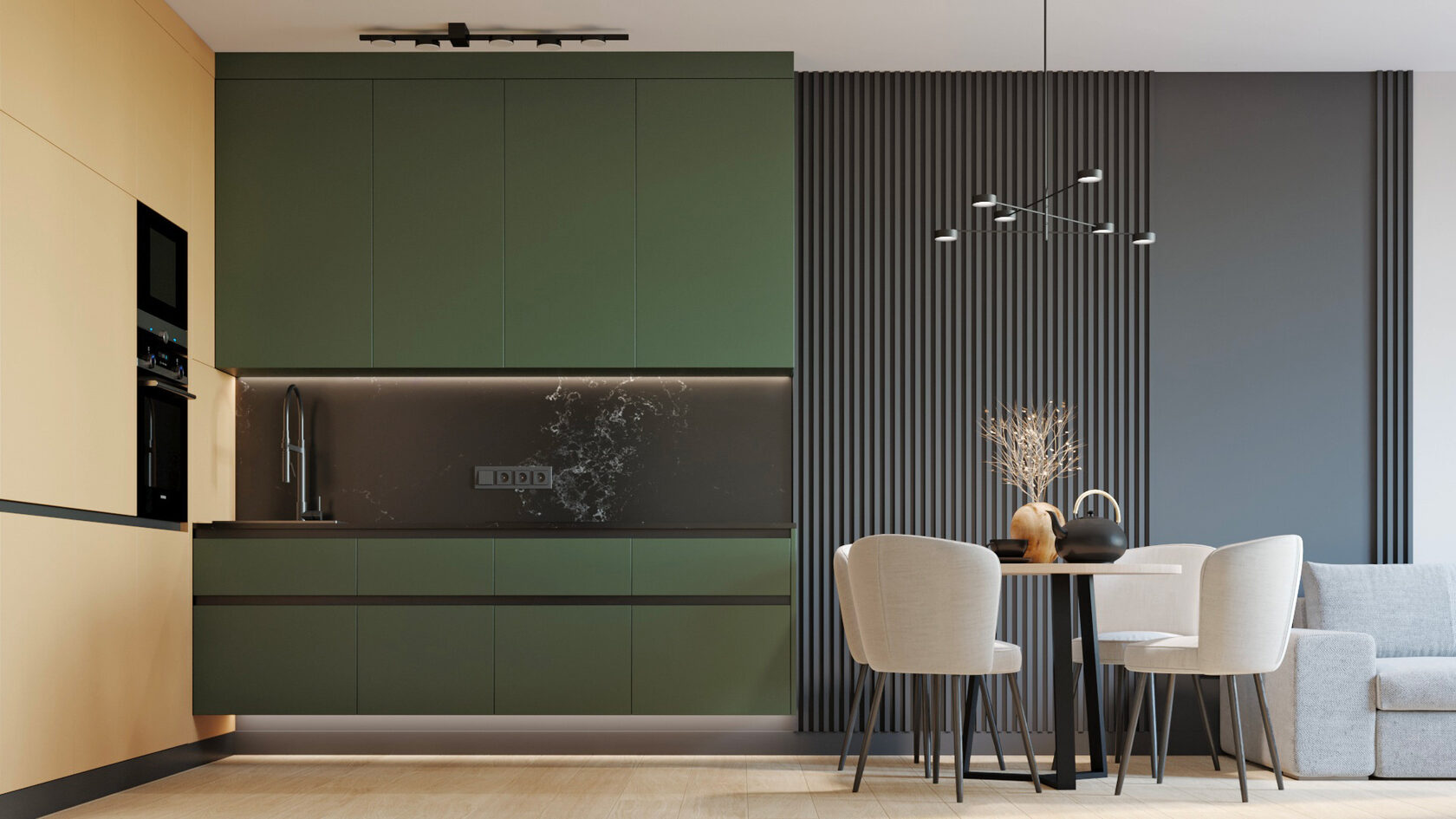 aménagement de studio avec cuisine moderne verte et espace repas compact