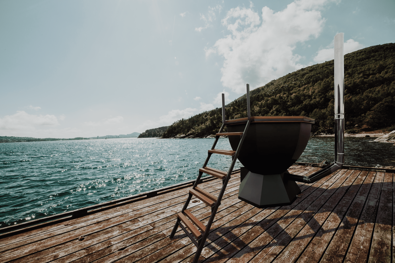 Банный чан на фоне озера и гор