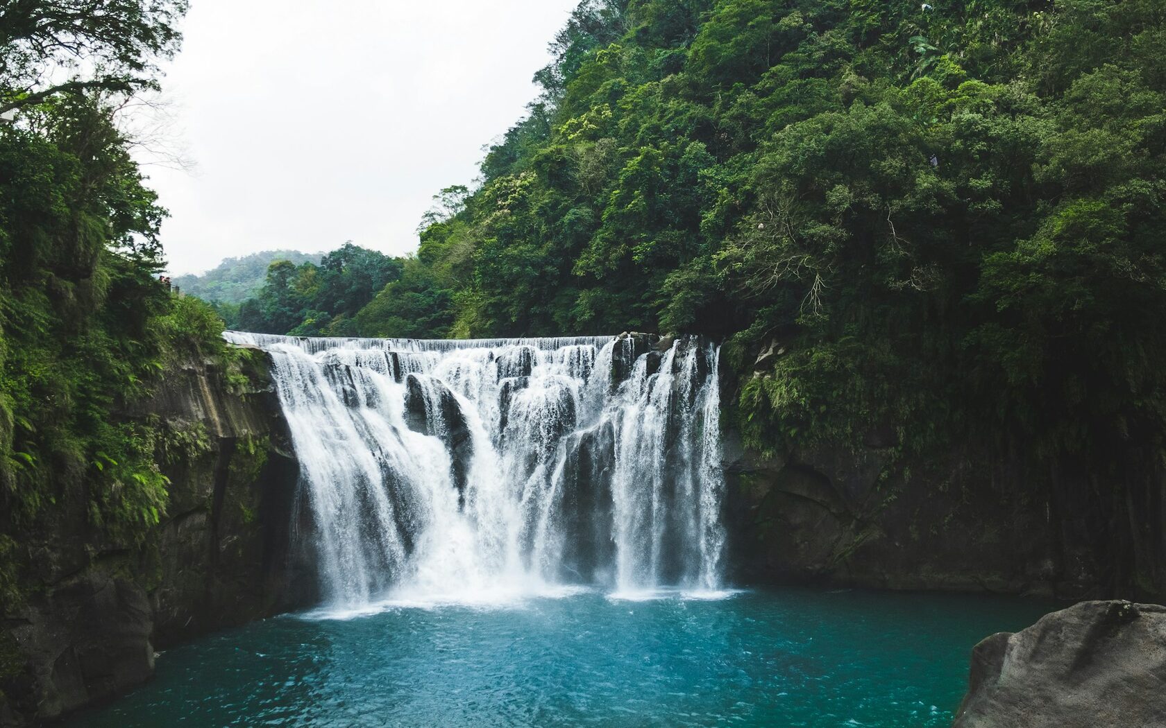 Tropical waterfall cascading