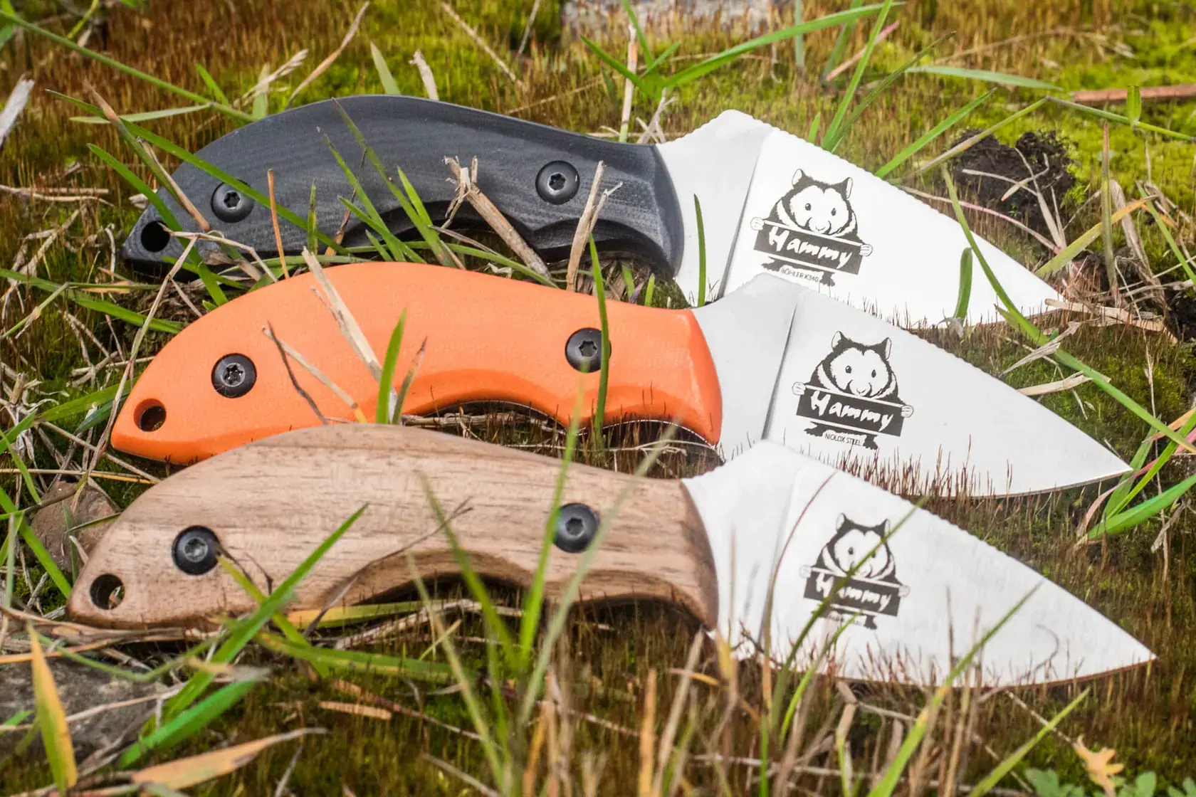 Three Kizlyar Supreme Hammy editions showing different steel and handle personalities