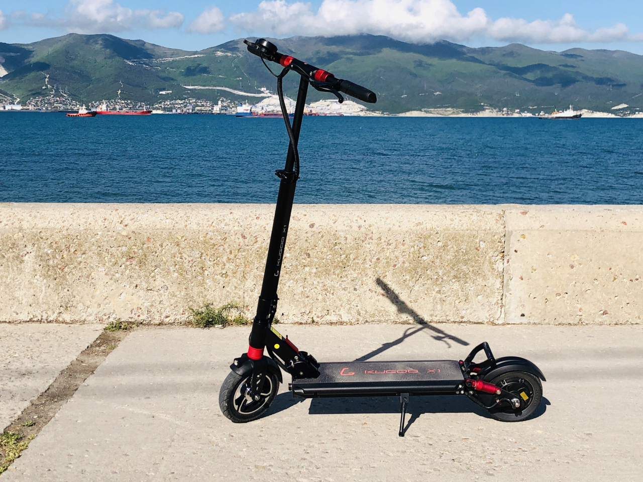 самокат Куго X1