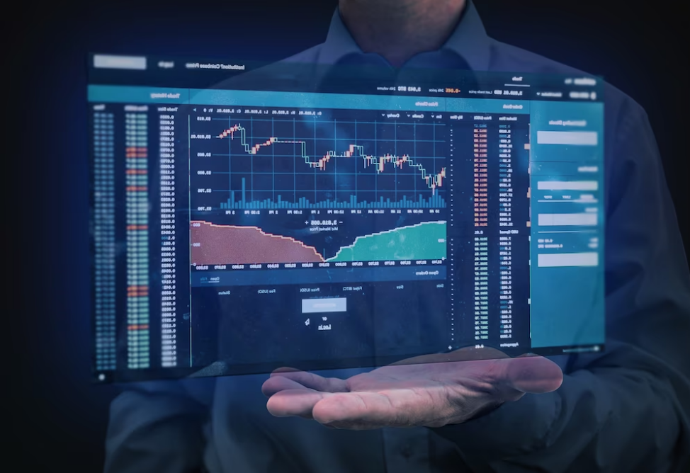 A man holds a virtual screen in his hand with stock charts and free trading signals