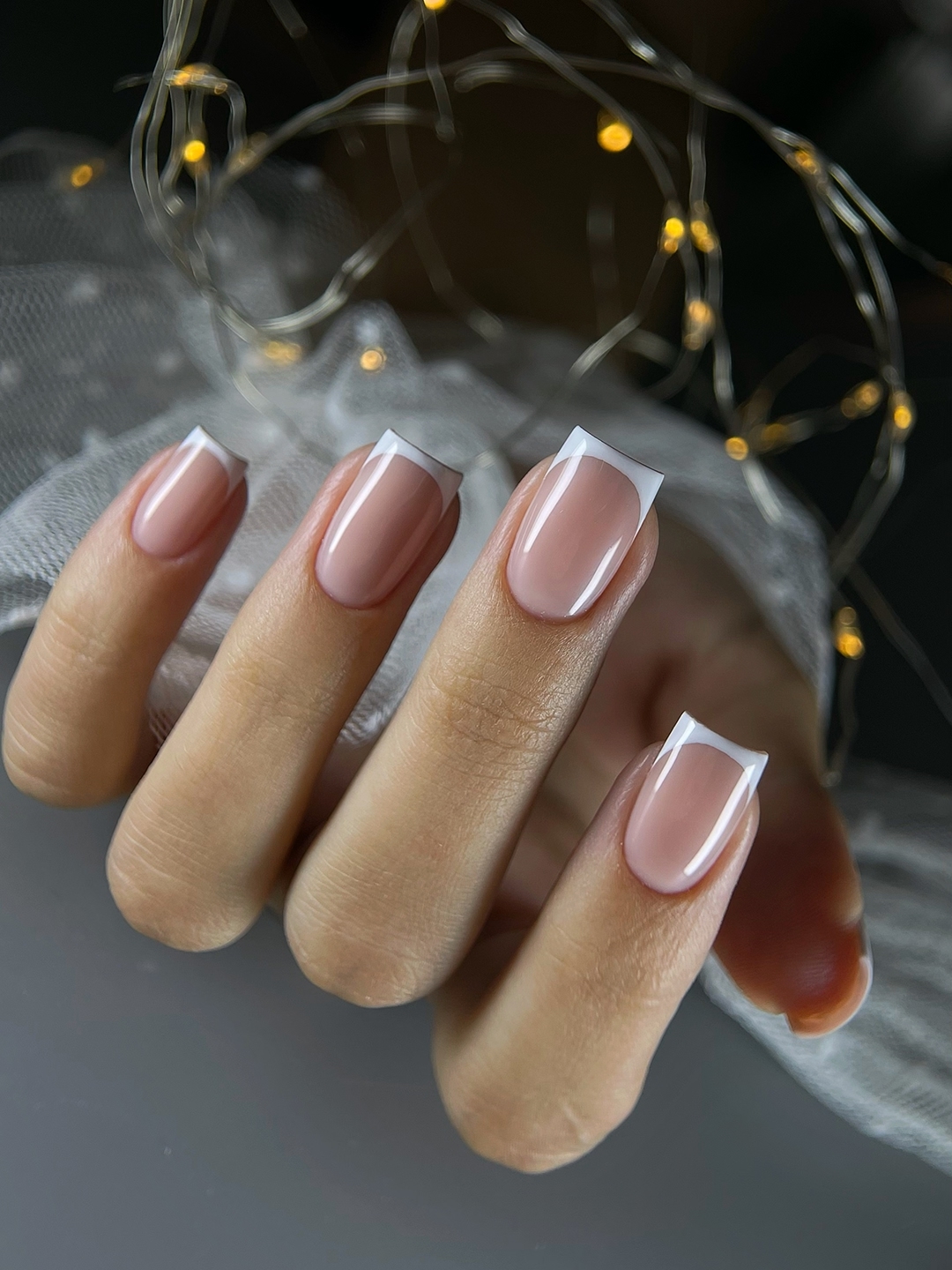 Французский маникюр с укреплением и покрытием - свежая работа мастера студии красоты Марии Зотько в Симферополе. Классический белый френч гелем.