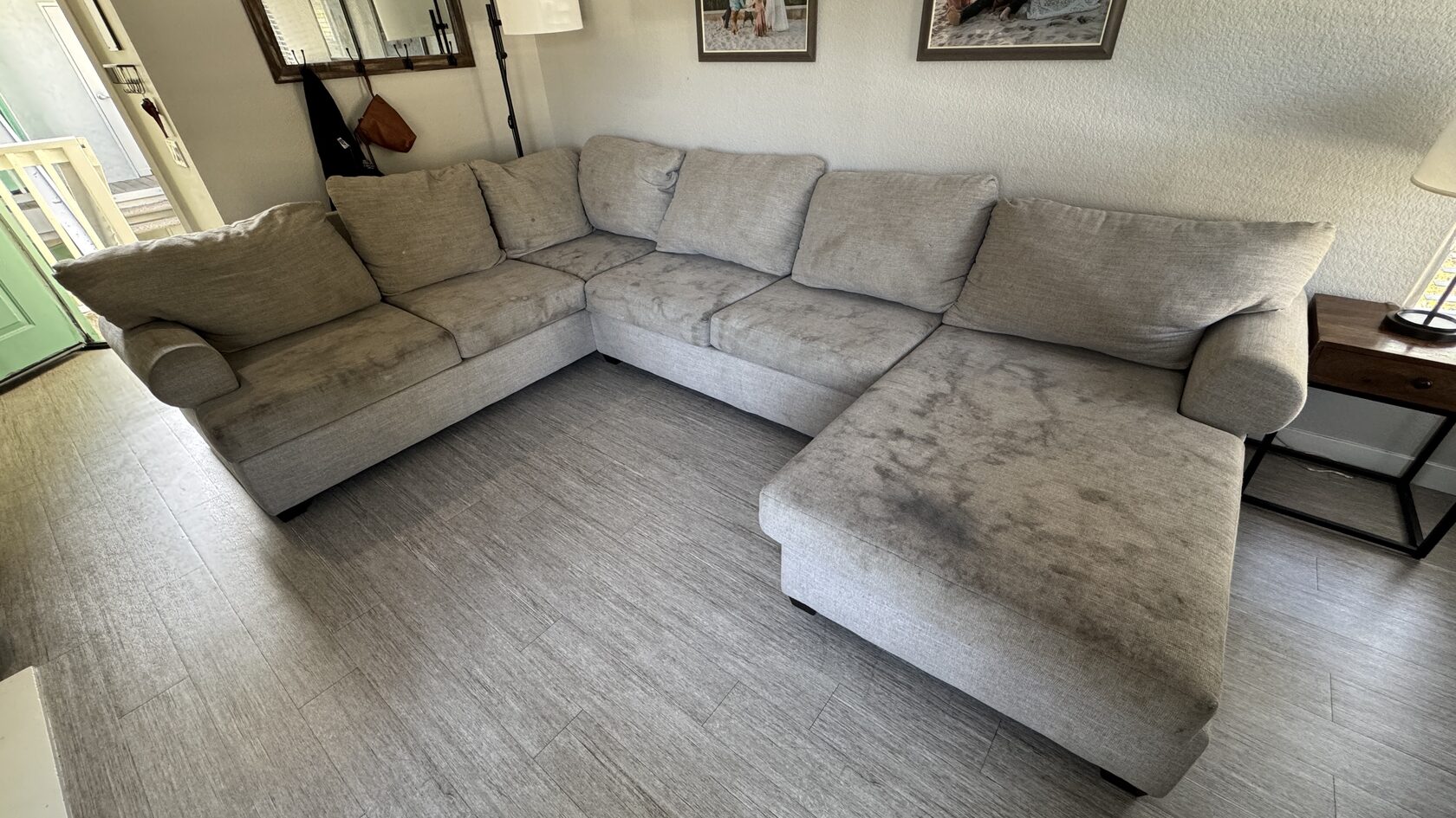 Sofa before cleaning, with visible stains