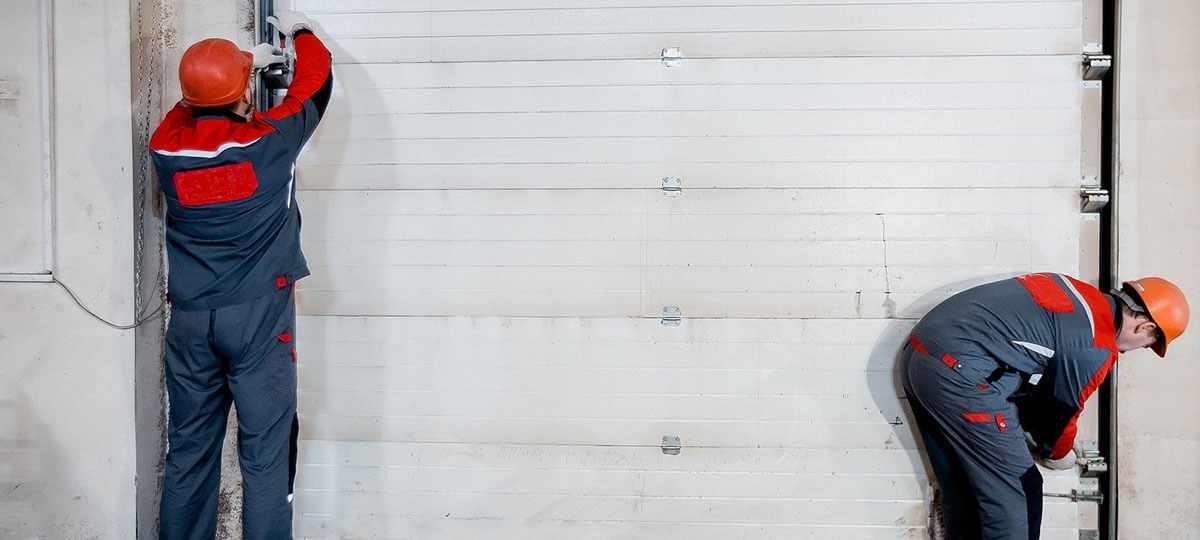 Ремонт гаражных секционных подъемных ворот в Караганде. - Arcstyle.kz