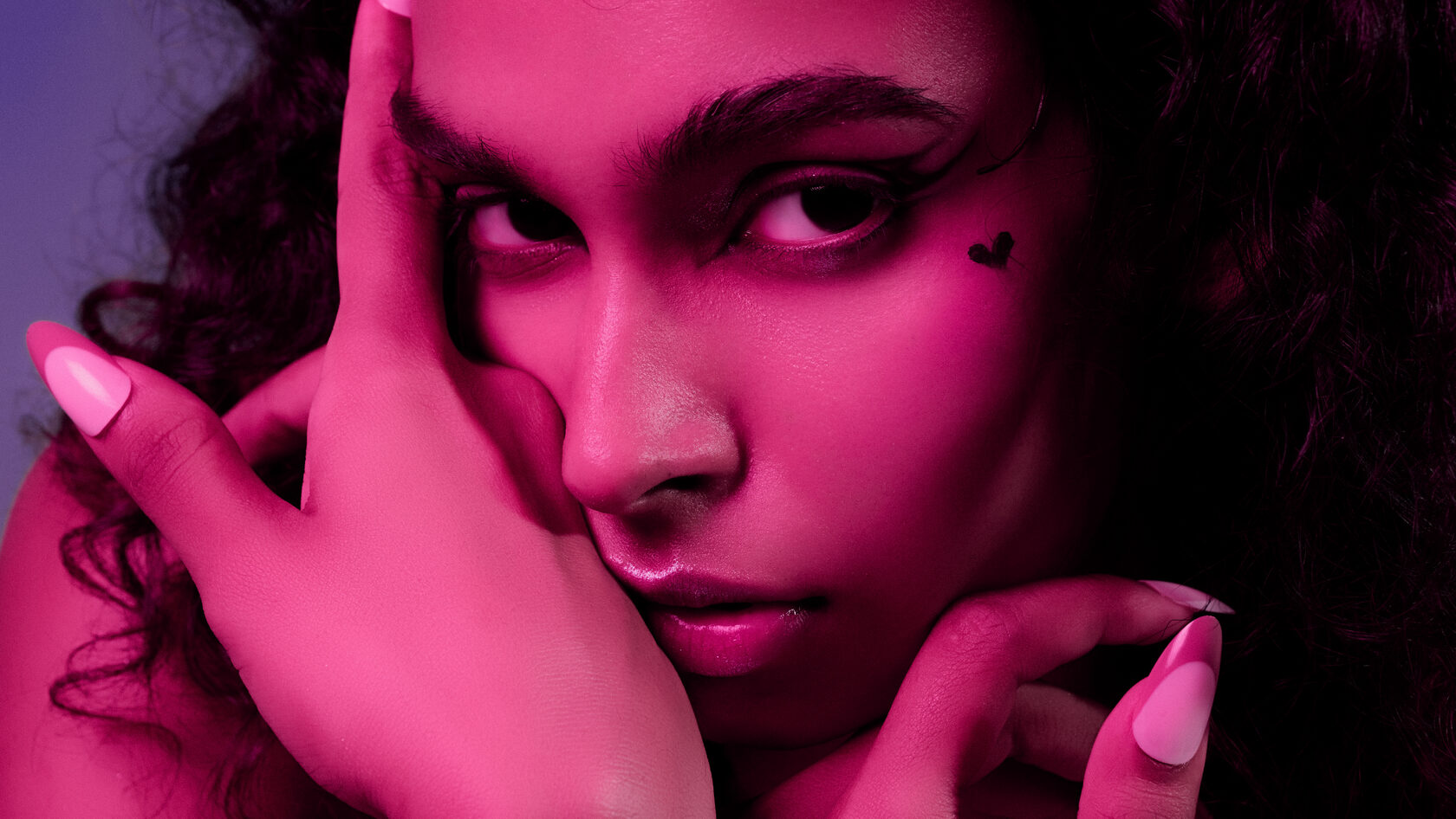 Pink-toned close-up from an Artego Magazine beauty editorial