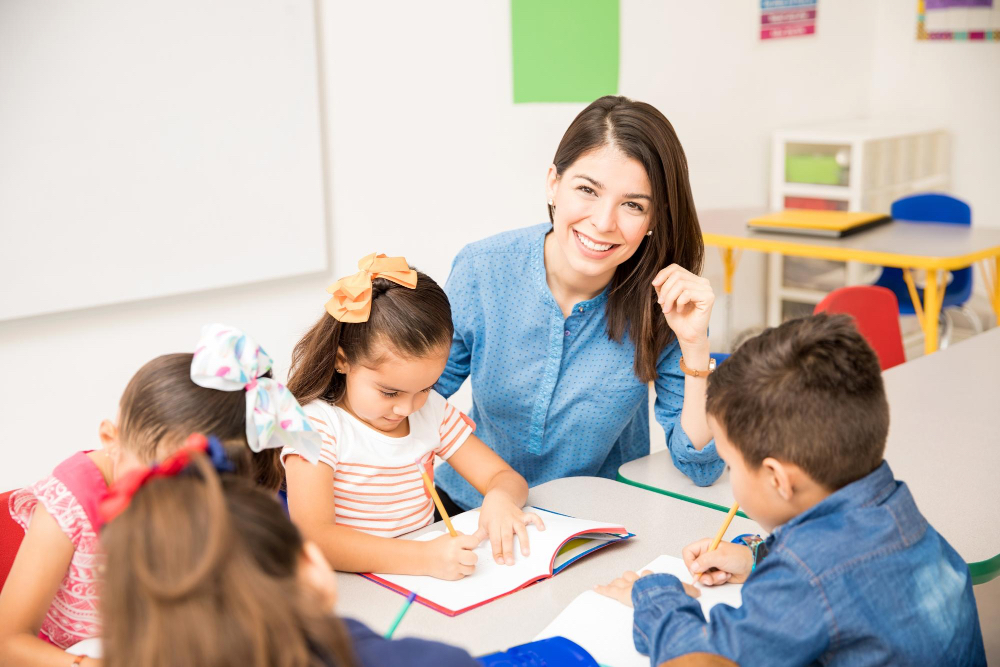 A delighted teacher among young students