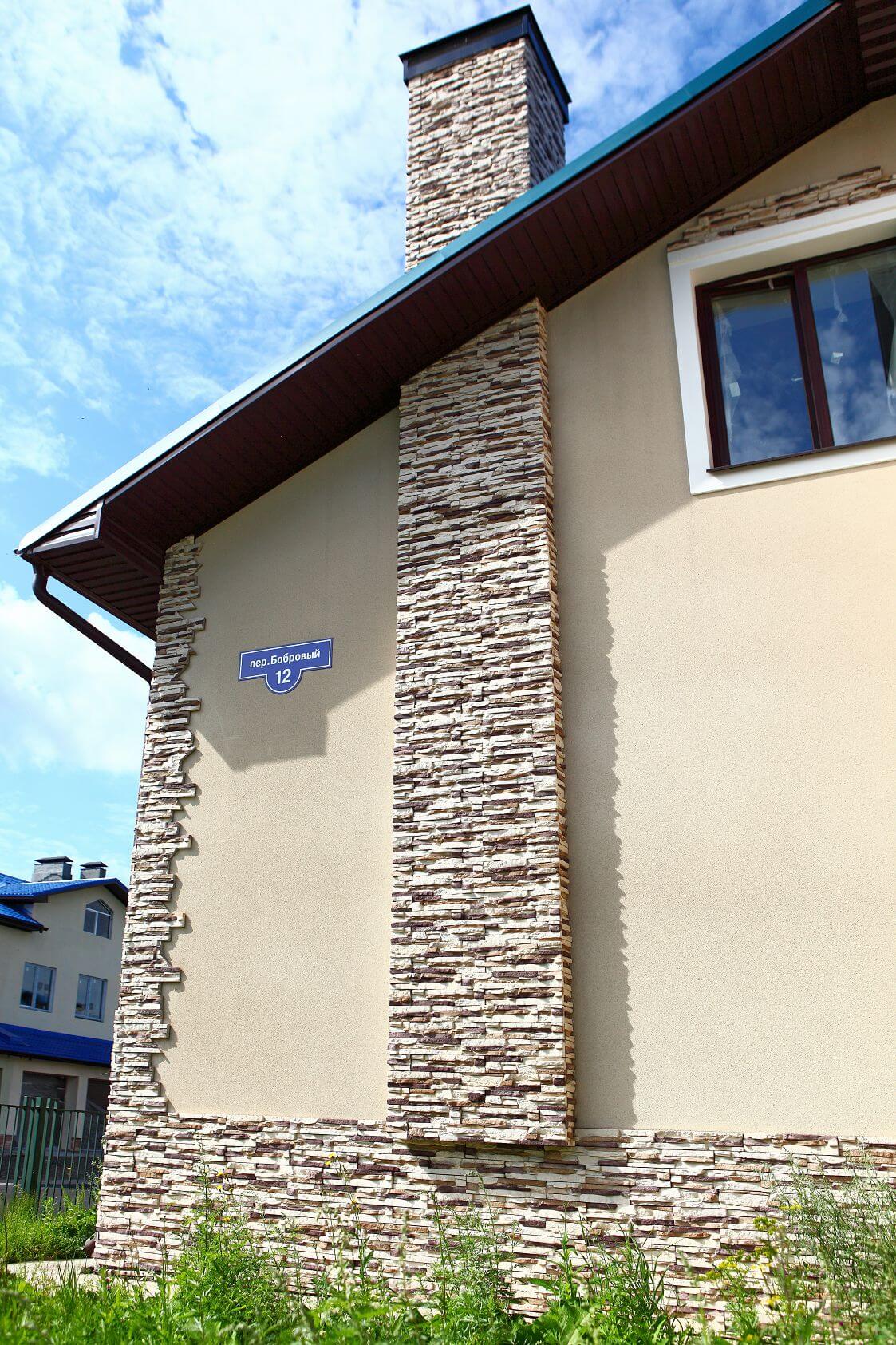отделка декоративным камнем фасада дома фото
