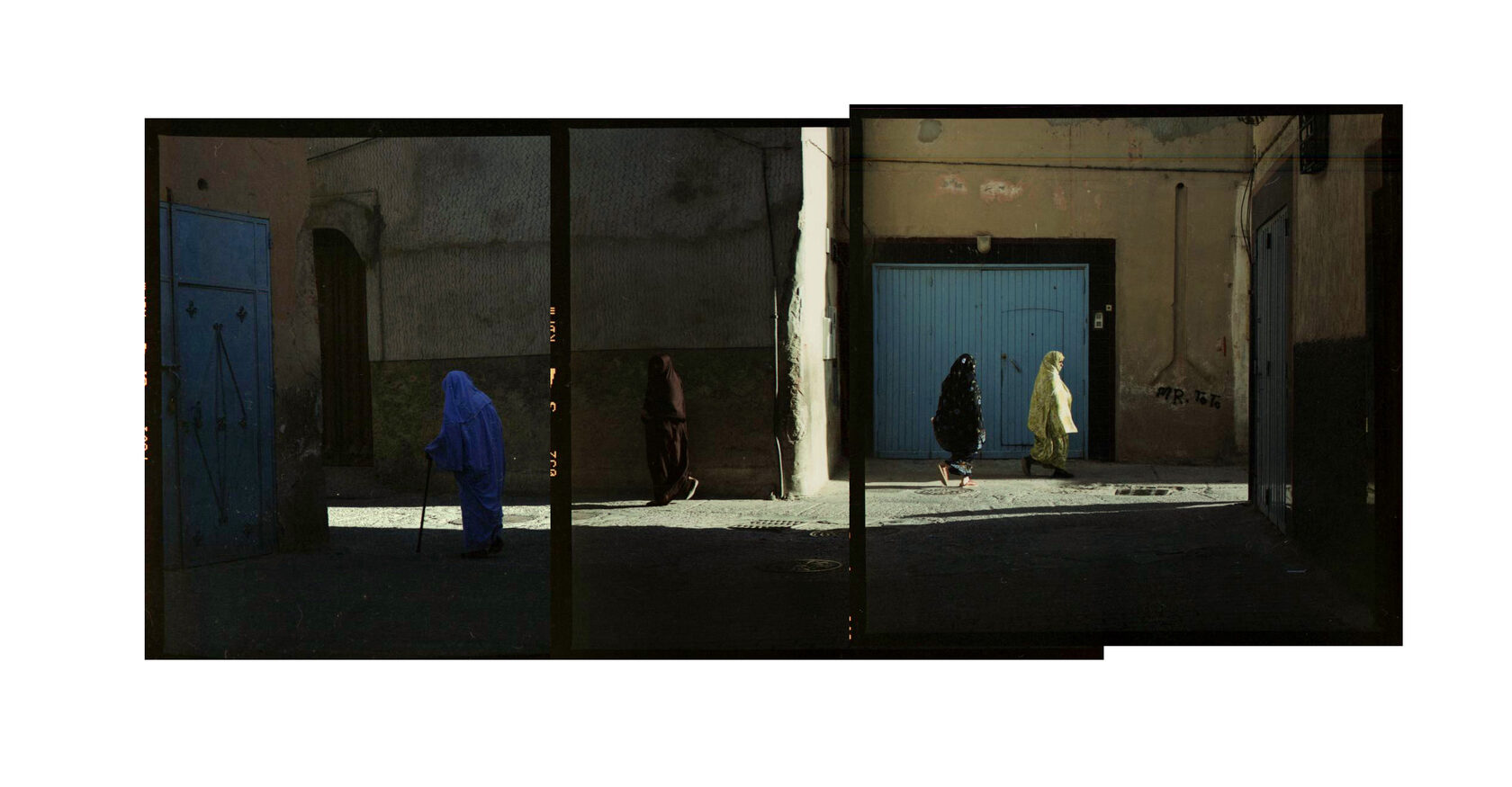 Morocсo. Tiznit. Colored djellabas. Color negative. 2011