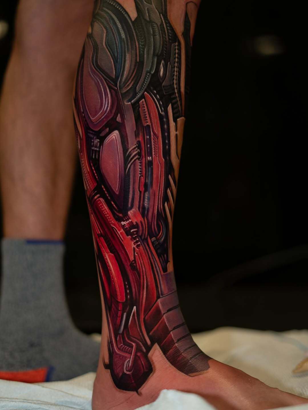 Biomechanical tattoo on the leg, Los Angeles