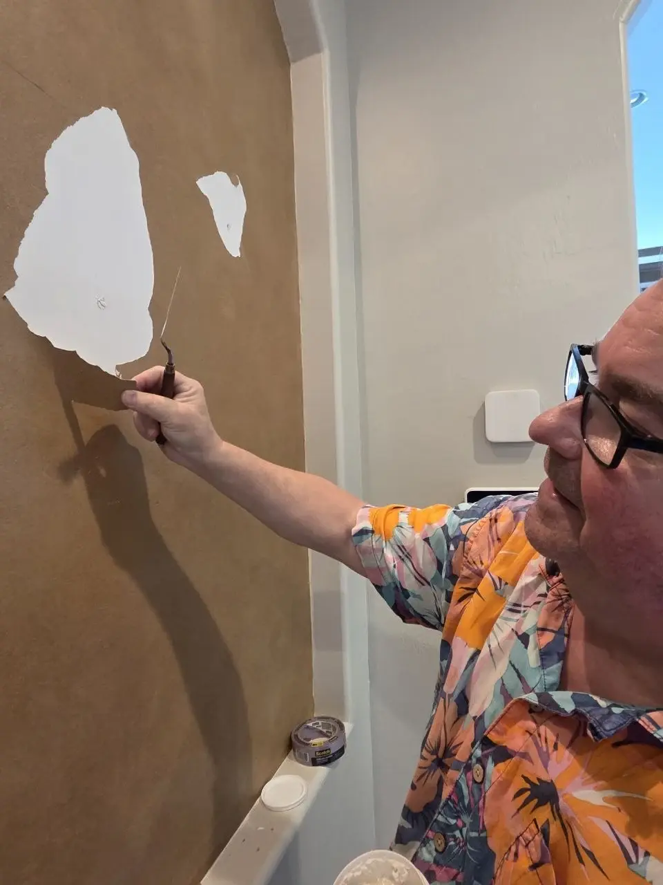 Artist applying a base layer during a custom Venetian plaster project in Lakewood Ranch.