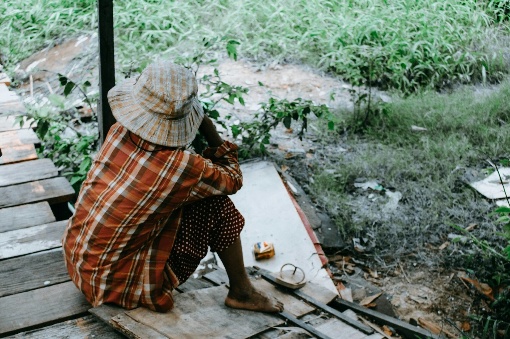 Samalia visiting an elderly Cambodian woman during a home visit