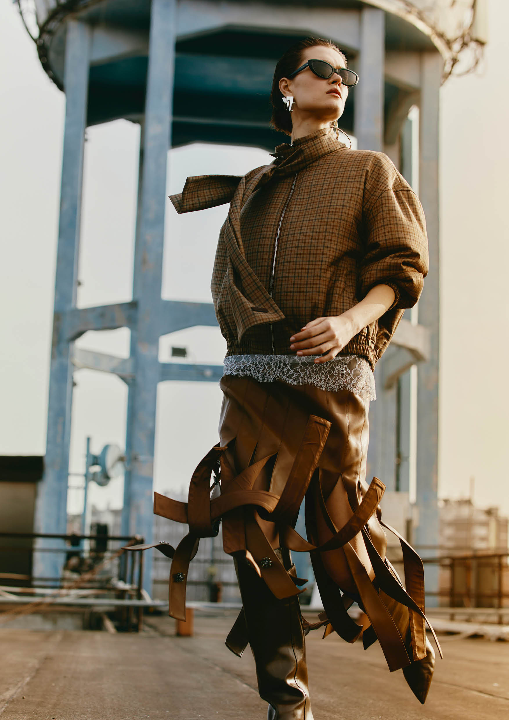 Isabelle Blanche Paris Autumn-Winter 2026/27: checked bomber with neck bow, lace and striped leather skirt