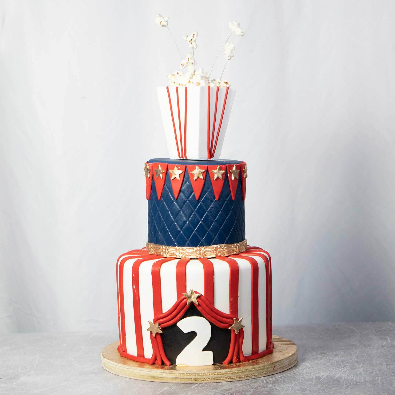 Sugar Cake Company - A cute 3 tier Circus cake with a girly feel for a  first birthday today 😊 Inside flavor for all 3 tiers was Peanut Butter  Cup, finished with fondant. | Facebook