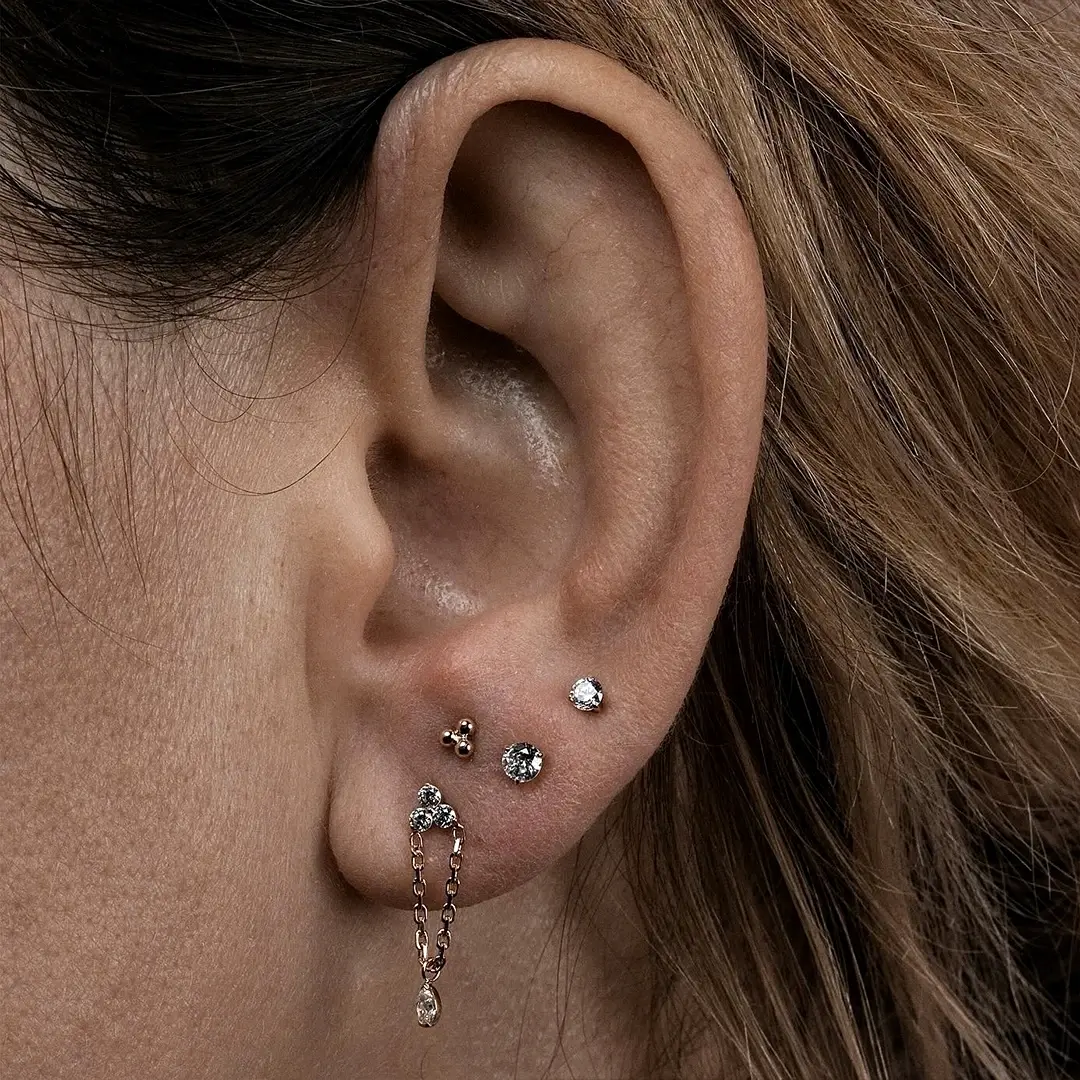 Заживший прокол мочки уха в HORN - Новосибирск