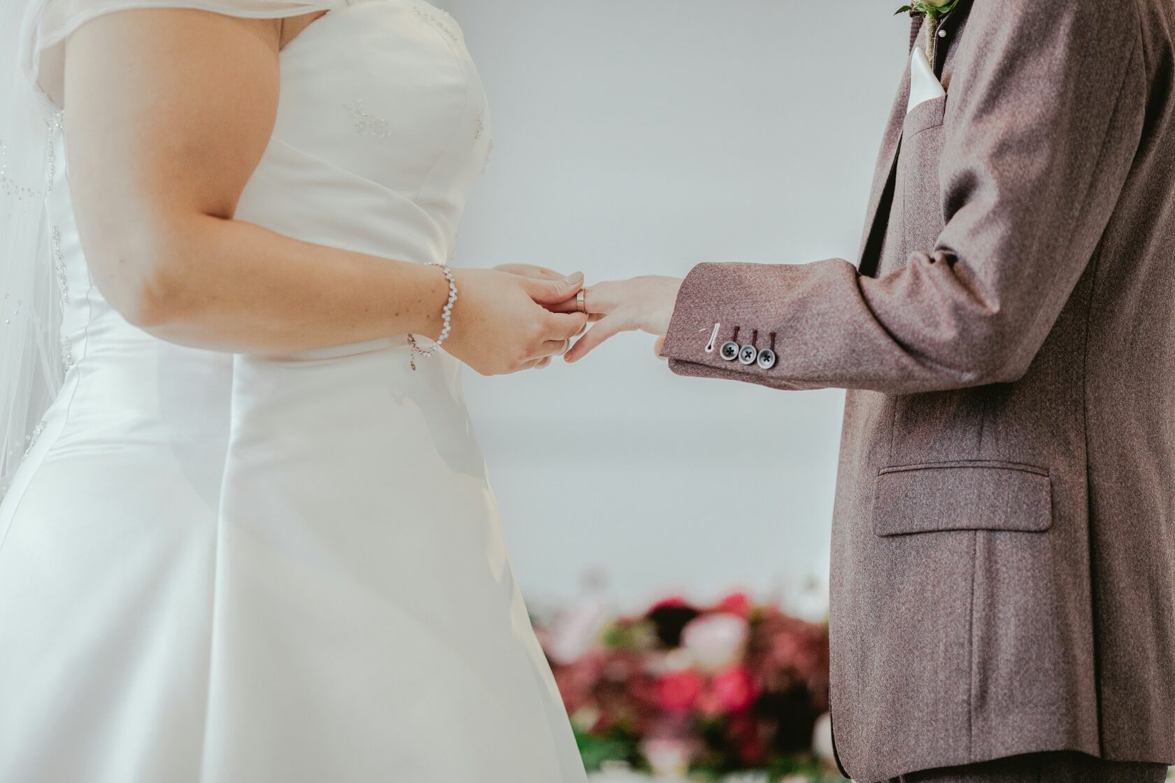 Married couple holding a marriage certificate