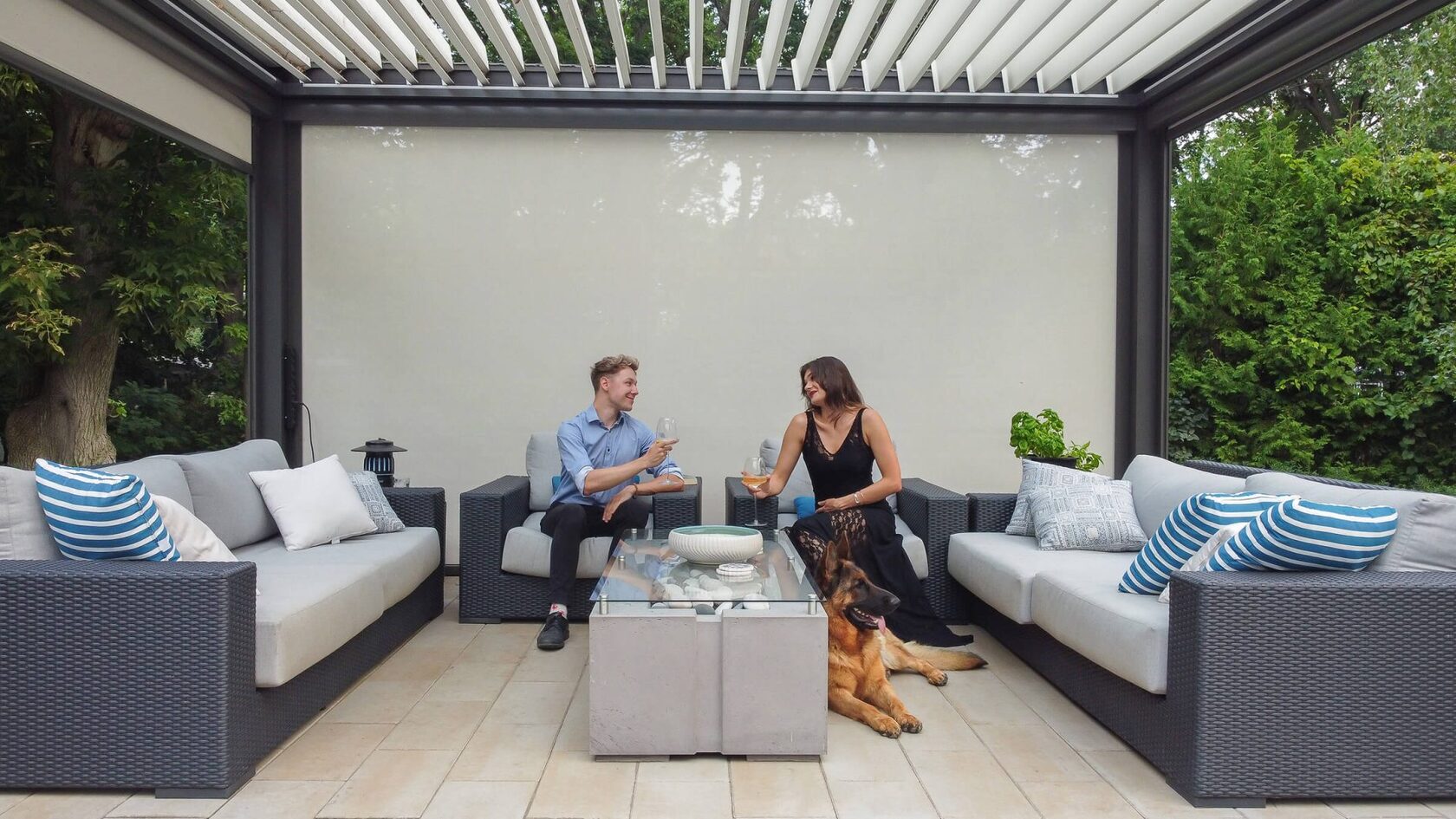 Luxury aluminum pergola lounge setup with louvered roof