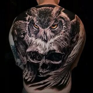Татуировки сов на спине