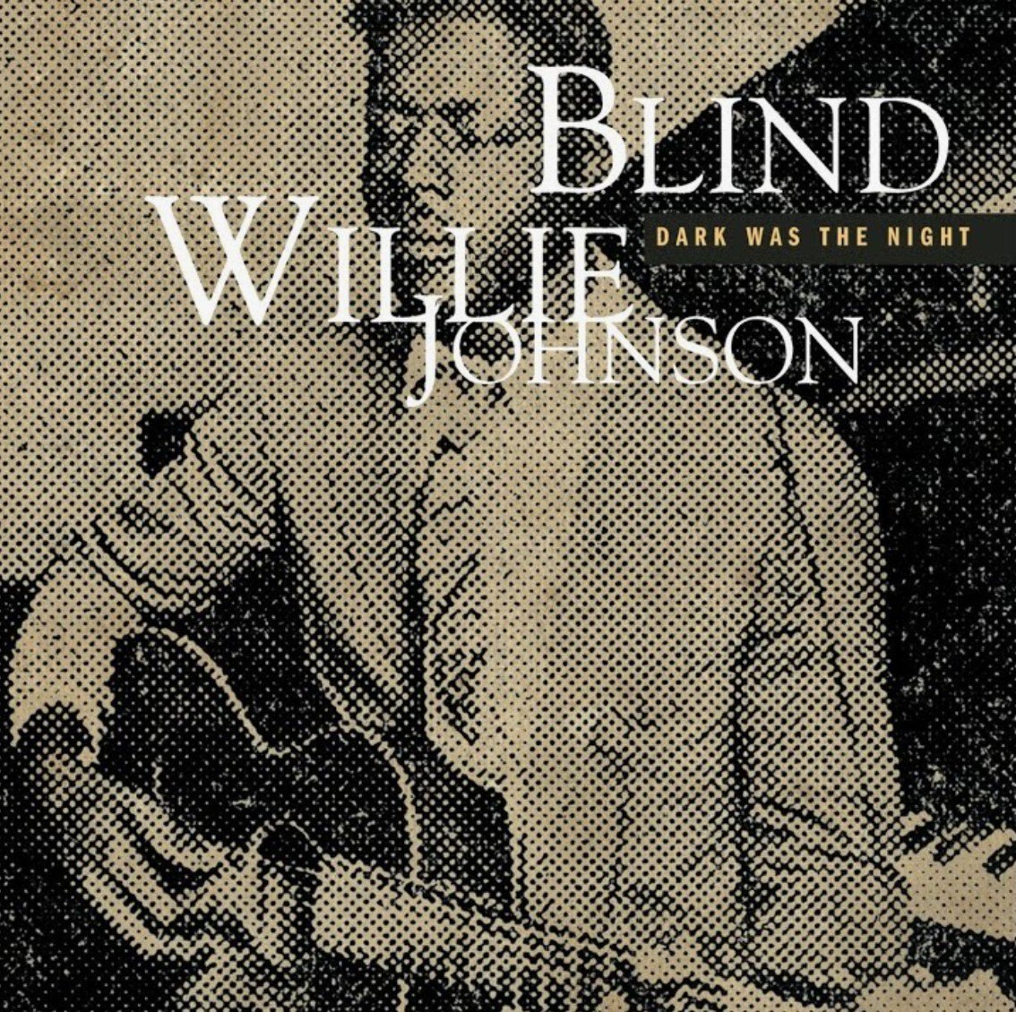 Обложка сборника Blind Willie Johnson «Dark Was the Night» с фотографией музыканта с гитарой