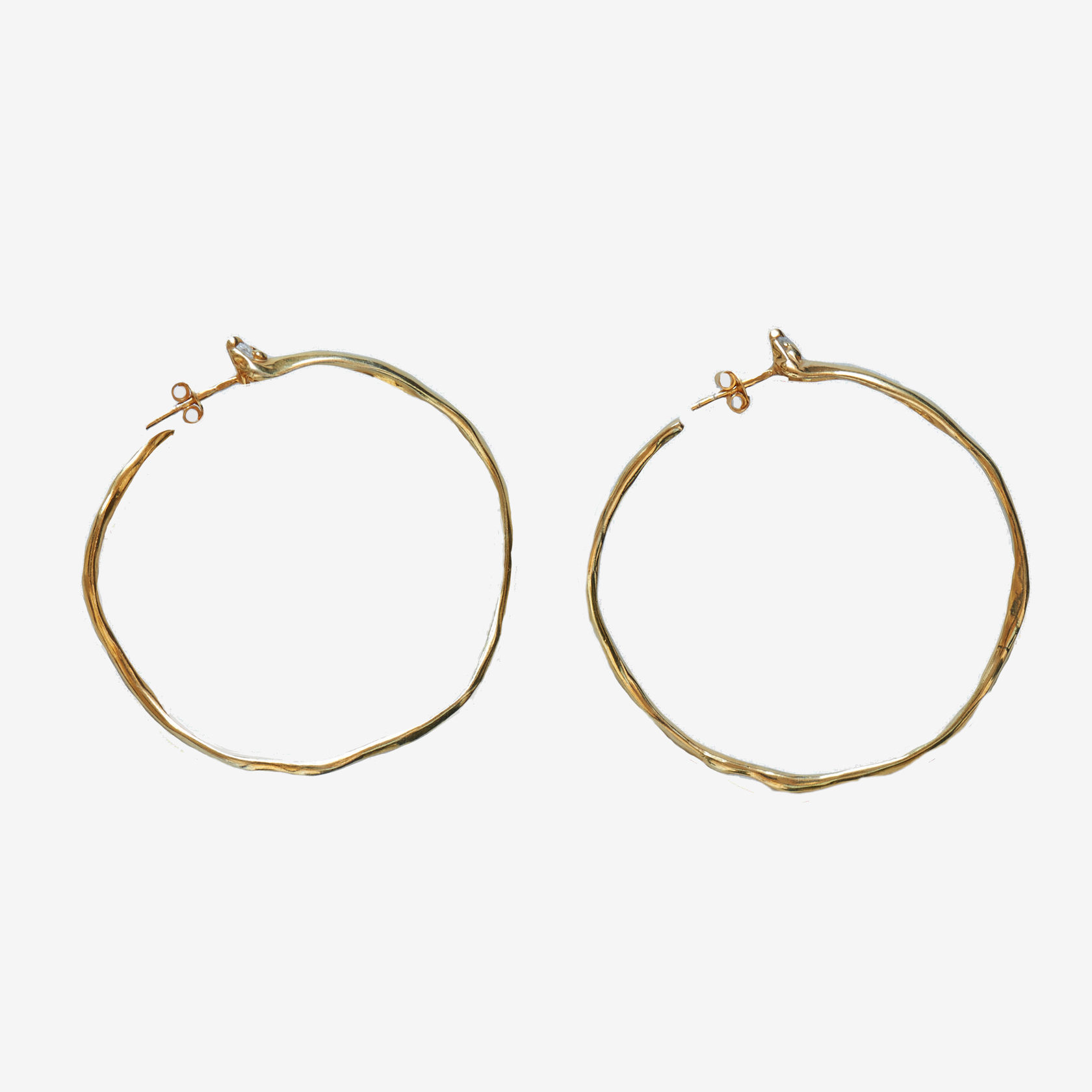 Серьги-кольца из латуни с бесцветными фианитами