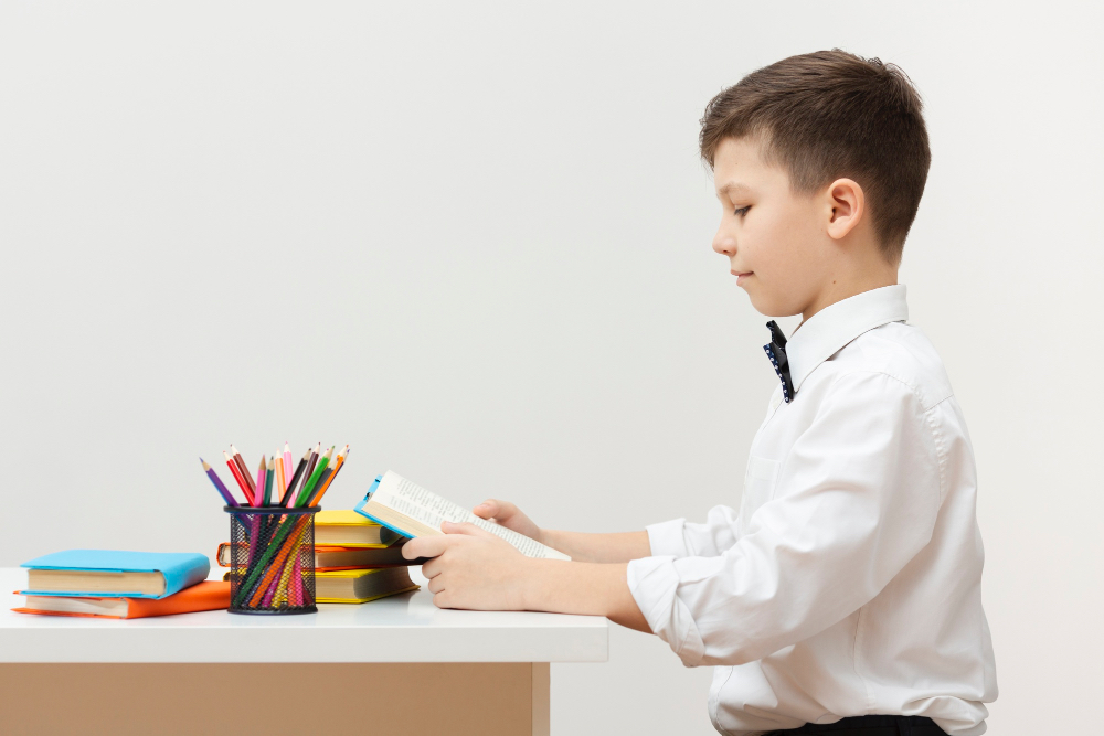 Boy sitting at school desk