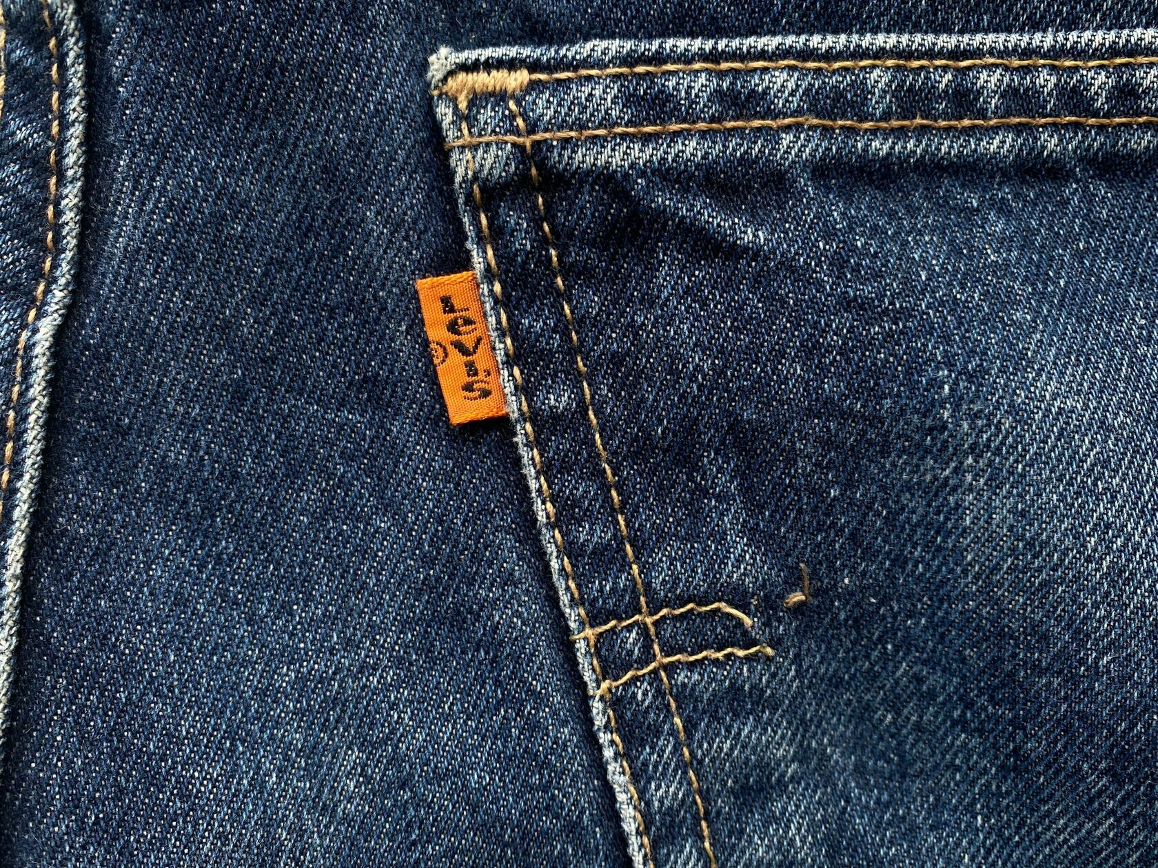 Strong and Reliable Dirt-Stained Dark Wash Carpenter Jeans