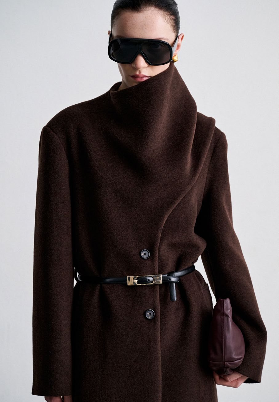 SU: brown coat with sculptural collar and belt