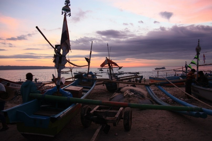 Sunset over anchored boats — the day closing, attention still awake