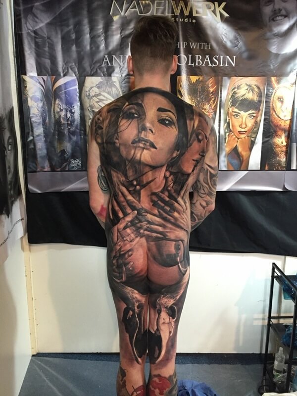 Large black and gray realism back piece by Andrey Kolbasin at the Milan Tattoo Convention 617