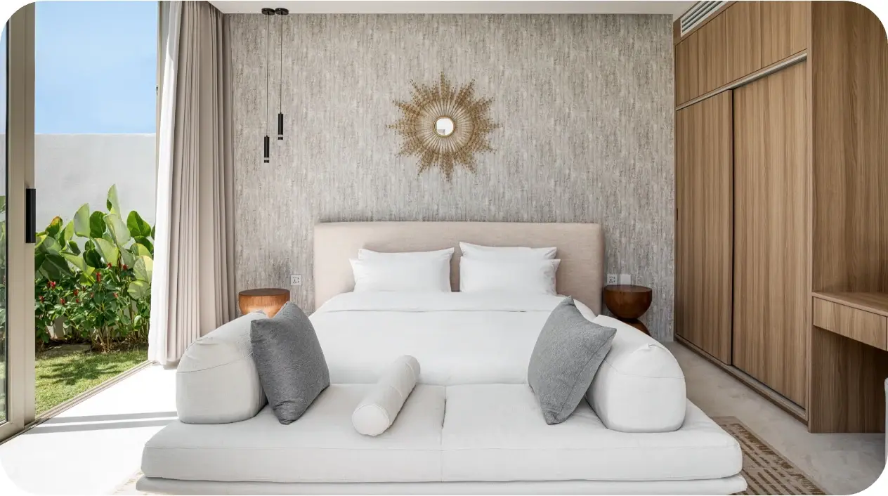 Main bedroom at Asherah Villa with a large bed