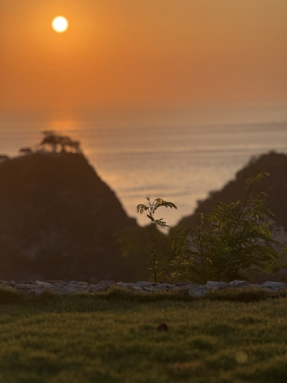 Sunset over the ocean at Intaaya