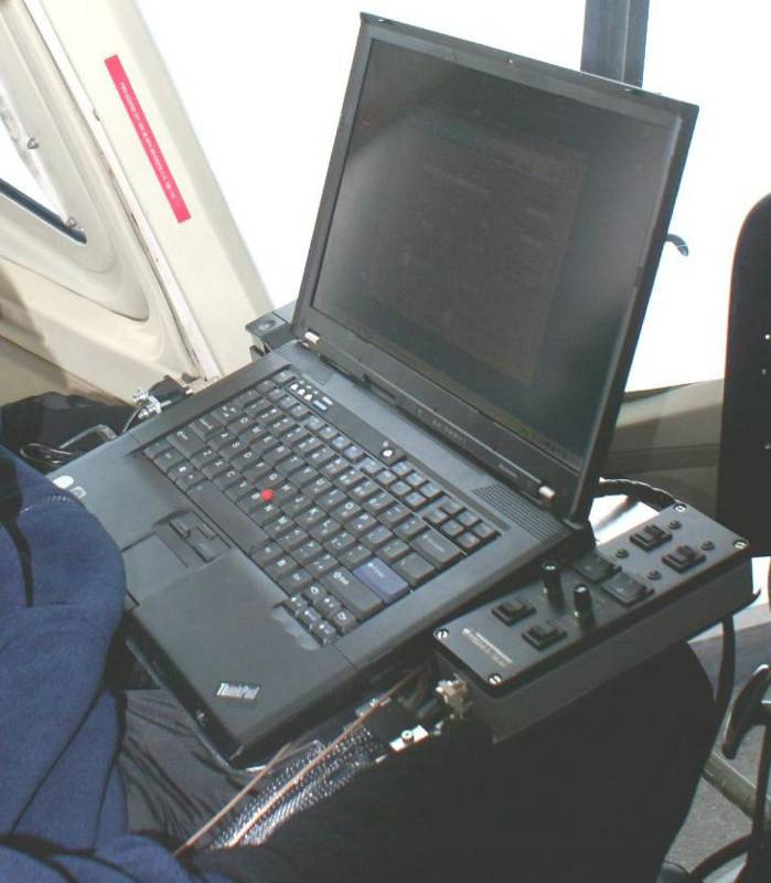 Figure 5 – ALMA G2 Laptop with C-Box. Held by Operator in Either Front or Back Seat